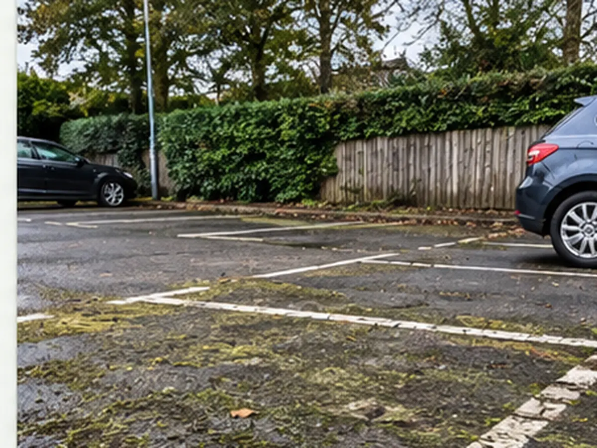 Weathered commercial car park exterior surface