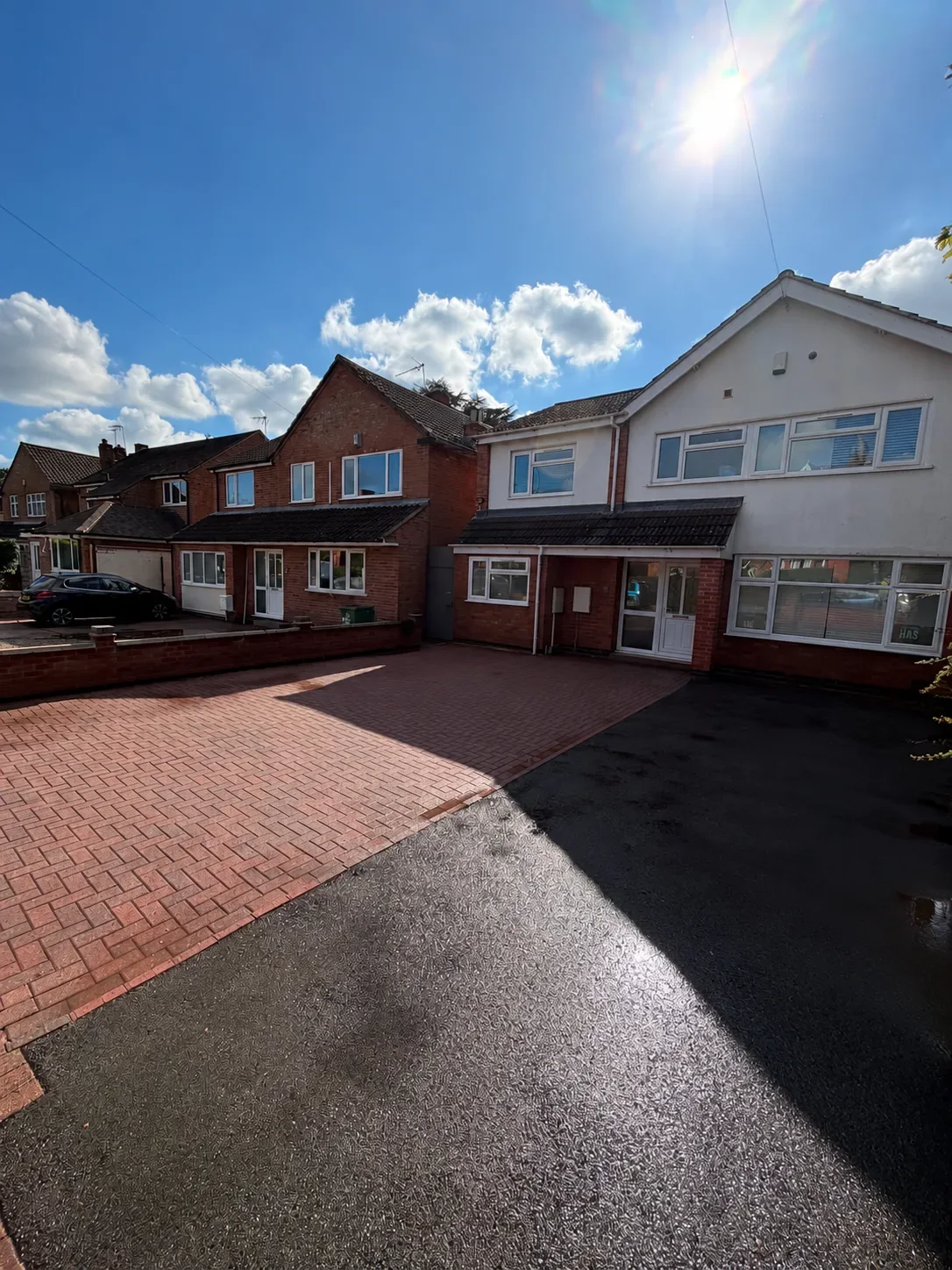 The same tarmac driveway in Loughborough after cleaning by Midland Revive.