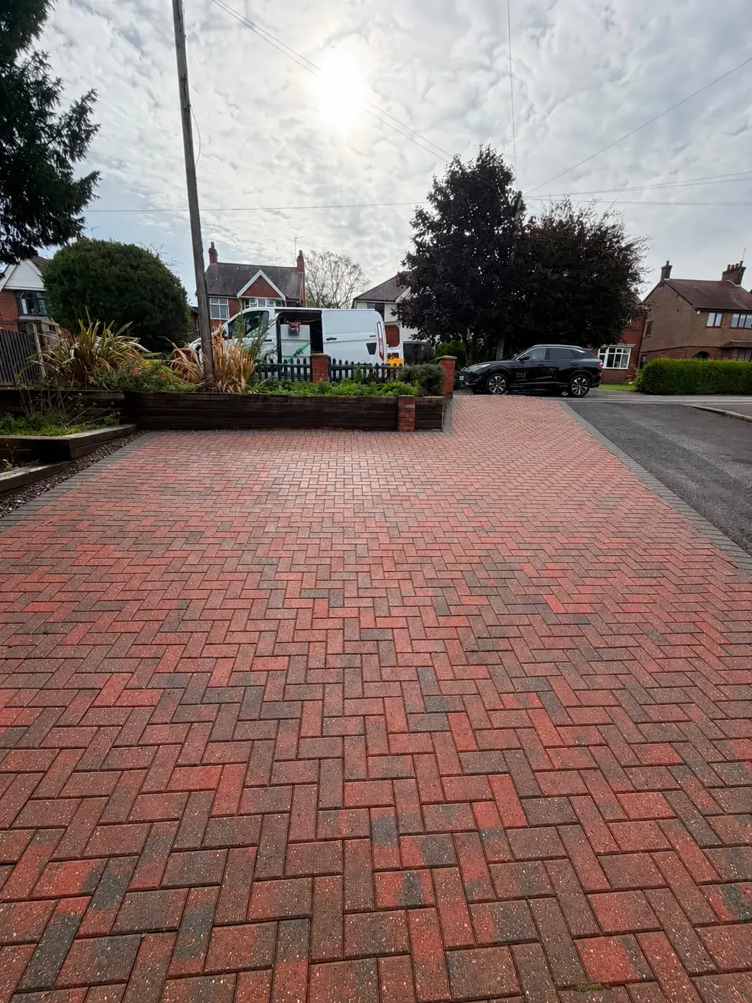 Cleaned block-paved driveway in Thringstone completed by Midland Revive.