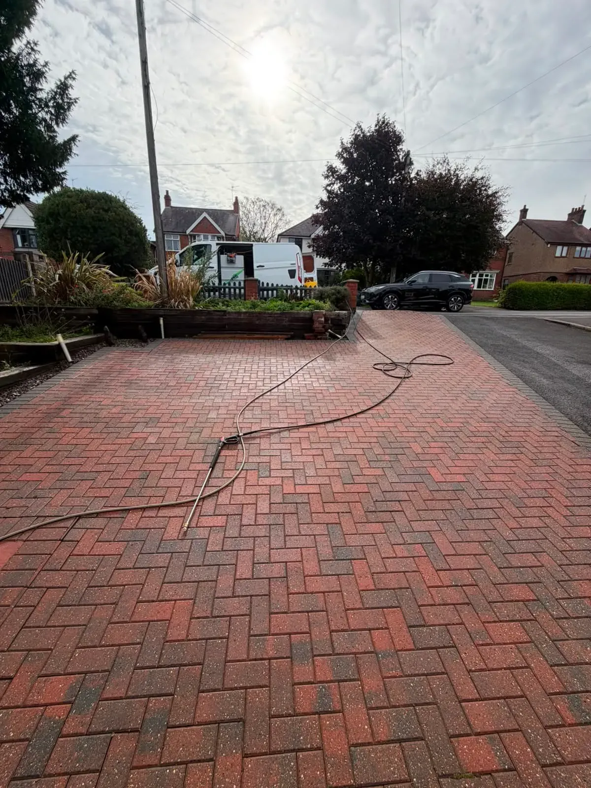 Another view of the completed driveway cleaning job in Thringstone.